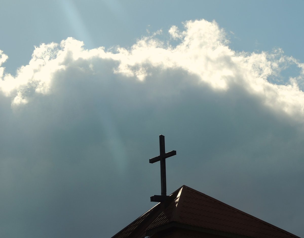 A cross against a dramatic sky