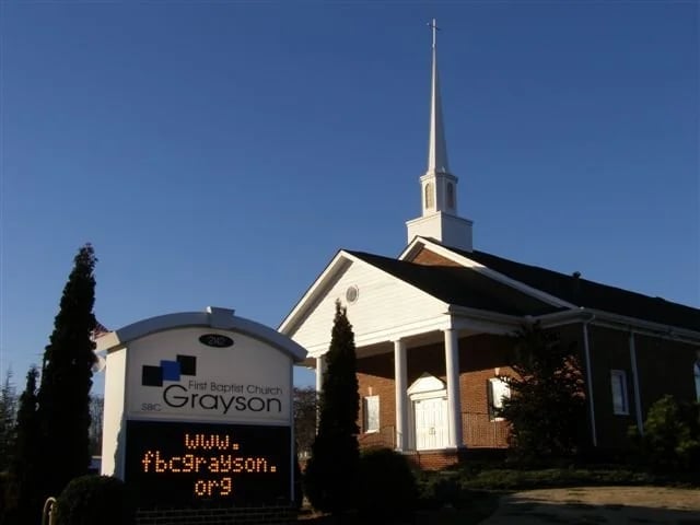 First Baptist Church of Grayson — brick building with white steeple